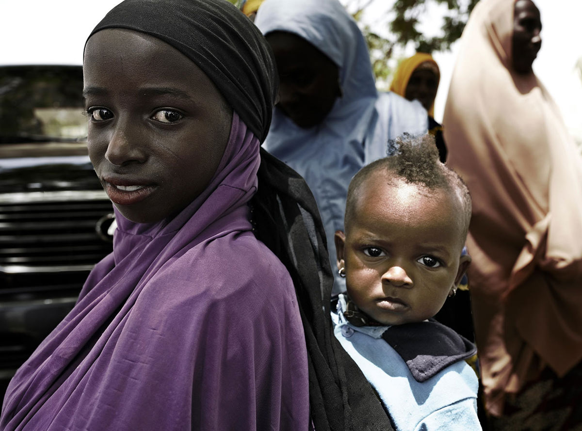 Women with child on back