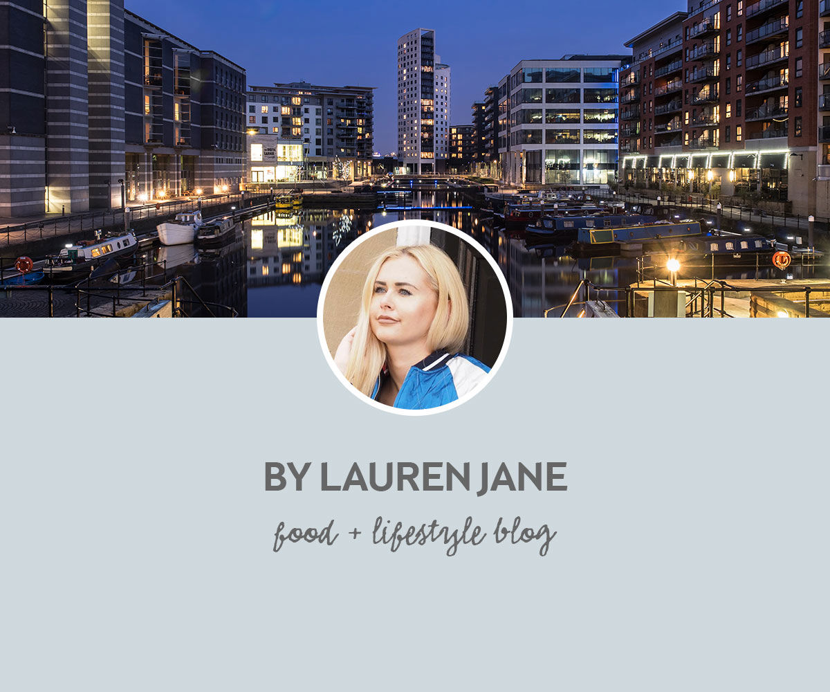 Portrait of Lauren Jane with a backdrop of the waterfront in Leeds