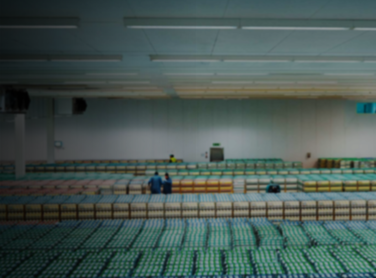 Trolleys of Arla milk in a warehouse