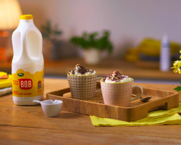 Chilli Hot Chocolate mugs next to a bottle of Arla B.O.B milk